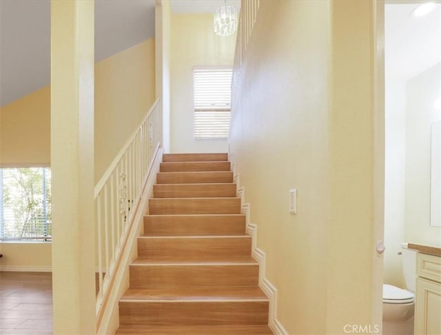 9315 Woodman Ave Unit 8, Arleta, CA 91331 - stairs with wood finished floors and baseboards