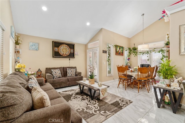 11149 Liverpool Ln, Riverside, CA 92503 - living room with light marble finish flooring, recessed lighting, and high vaulted ceiling