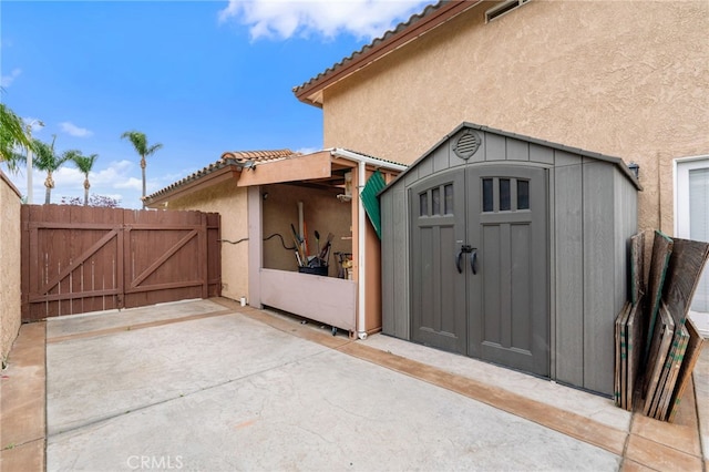 11149 Liverpool Ln, Riverside, CA 92503 - view of shed featuring a gate and fence