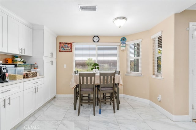 11149 Liverpool Ln, Riverside, CA 92503 - dining room featuring light marble finish flooring and baseboards