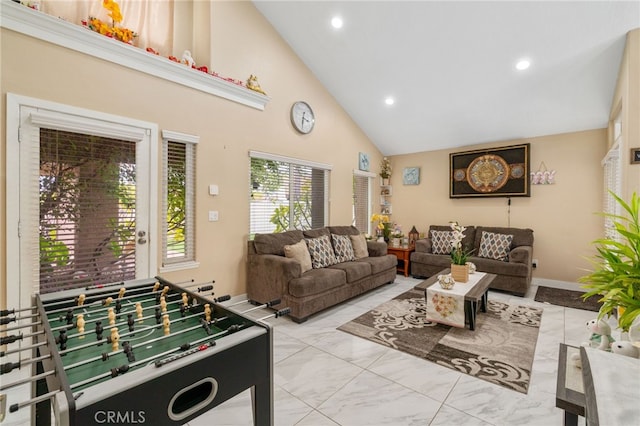 11149 Liverpool Ln, Riverside, CA 92503 - playroom featuring high vaulted ceiling, marble look tile flooring, recessed lighting, and baseboards