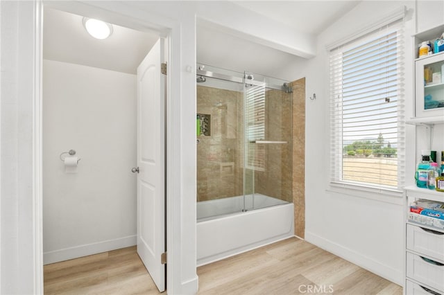 11149 Liverpool Ln, Riverside, CA 92503 - bathroom featuring wood finished floors, plenty of natural light, and baseboards