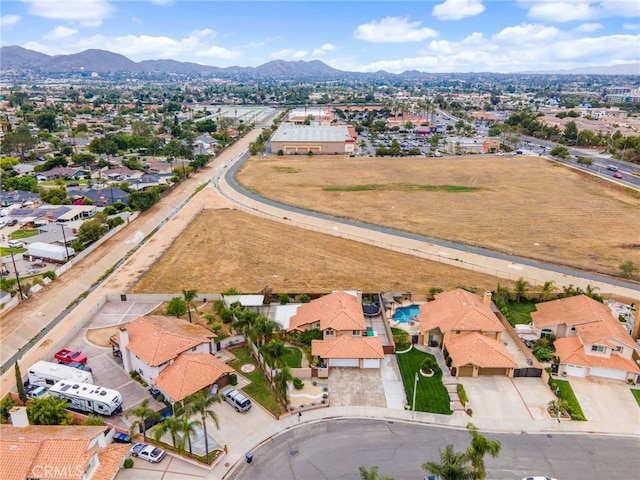 11149 Liverpool Ln, Riverside, CA 92503 - aerial perspective of suburban area featuring a mountainous background