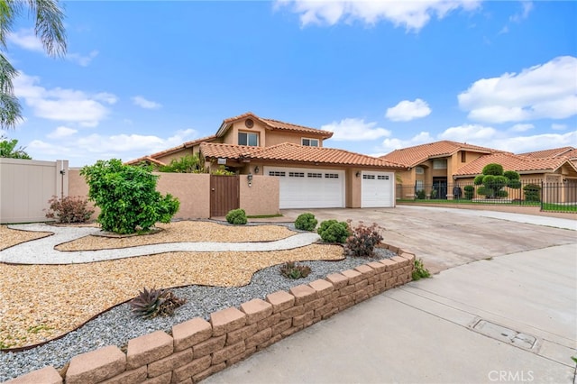 11149 Liverpool Ln, Riverside, CA 92503 - mediterranean / spanish-style home with a gate, stucco siding, concrete driveway, fence, and an attached garage