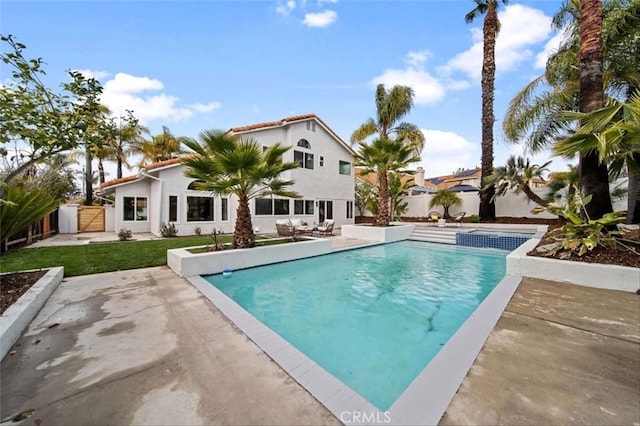 30901 Wellington Cir, Temecula, CA 92591 - view of pool with a fenced backyard, a patio, a gate, and a pool with connected hot tub