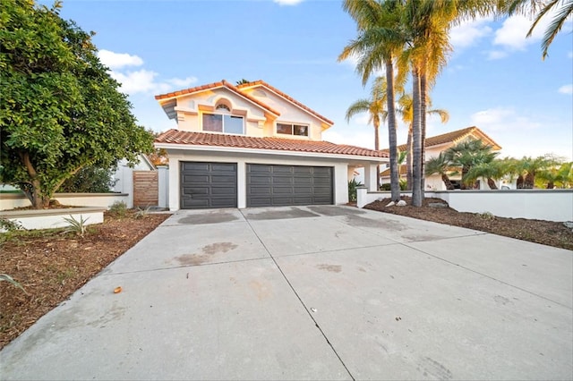 30901 Wellington Cir, Temecula, CA 92591 - mediterranean / spanish house with driveway, stucco siding, a garage, and a tile roof