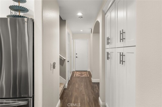 2130 Almeria St Unit 101, Corona, CA 92879 - hallway with arched walkways, dark wood-style floors, recessed lighting, and baseboards