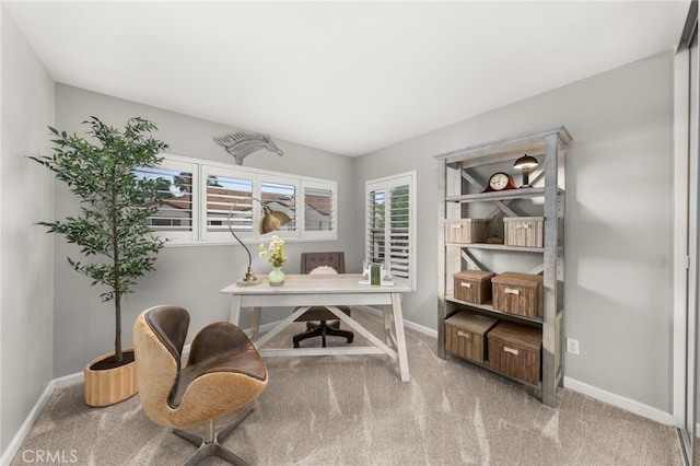 2130 Almeria St Unit 101, Corona, CA 92879 - home office with healthy amount of natural light, carpet flooring, and baseboards