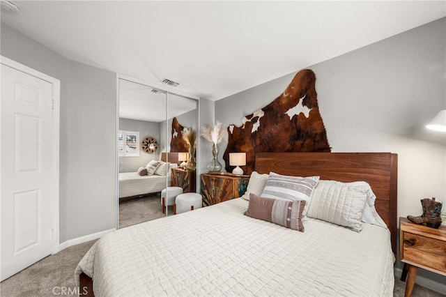 2130 Almeria St Unit 101, Corona, CA 92879 - bedroom featuring carpet flooring, a closet, and baseboards