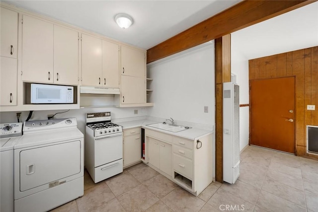 410 N Las Flores Dr, Nipomo, CA 93444 - kitchen with white appliances, independent washer and dryer, a sink, cream cabinetry, and under cabinet range hood