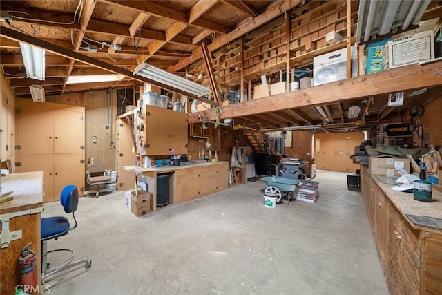 410 N Las Flores Dr, Nipomo, CA 93444 - misc room with a workshop area and unfinished concrete floors