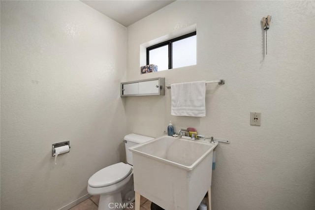 410 N Las Flores Dr, Nipomo, CA 93444 - bathroom with toilet, a sink, and tile patterned flooring