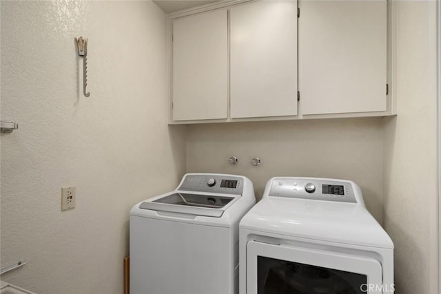 410 N Las Flores Dr, Nipomo, CA 93444 - laundry area with cabinet space, independent washer and dryer, and a textured wall