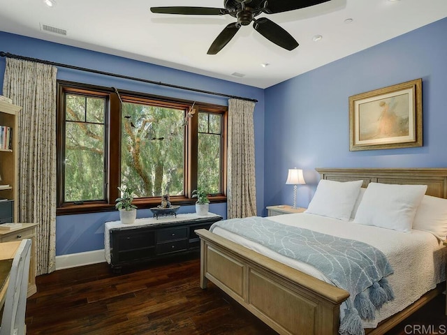 bedroom featuring dark wood finished floors, baseboards, a ceiling fan, and recessed lighting