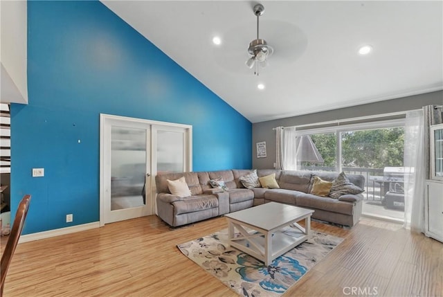 6621 Caro St Unit 111, Paramount, CA 90723 - living area with high vaulted ceiling, ceiling fan, wood finished floors, recessed lighting, and baseboards