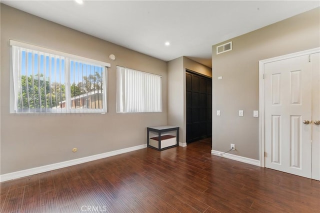 6621 Caro St Unit 111, Paramount, CA 90723 - unfurnished room with baseboards, wood finished floors, and recessed lighting
