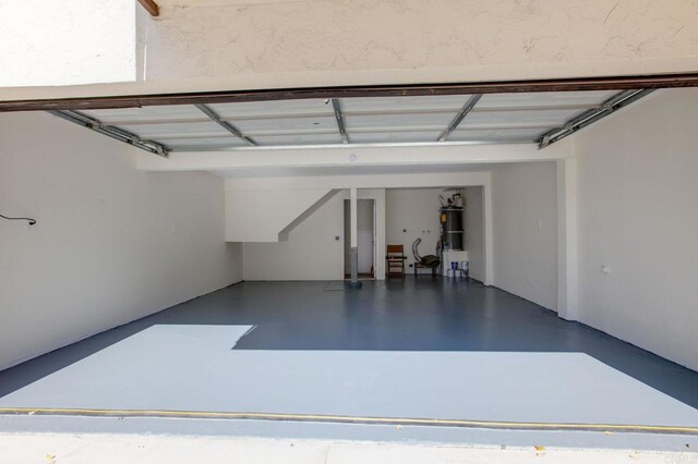 2404 Altisma Way Unit C, Carlsbad, CA 92009 - garage featuring secured water heater