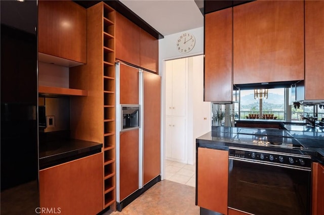 32735 Seagate Dr Unit 304-D, Rancho Palos Verdes, CA 90275 - kitchen with oven, paneled refrigerator, dark countertops, and open shelves