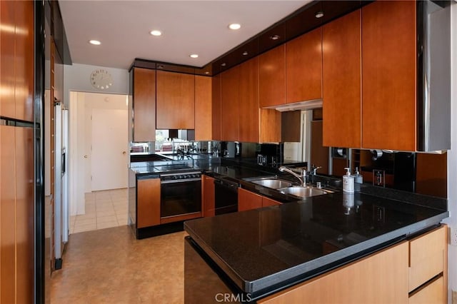 32735 Seagate Dr Unit 304-D, Rancho Palos Verdes, CA 90275 - kitchen with wall oven, black dishwasher, a peninsula, dark countertops, and a sink
