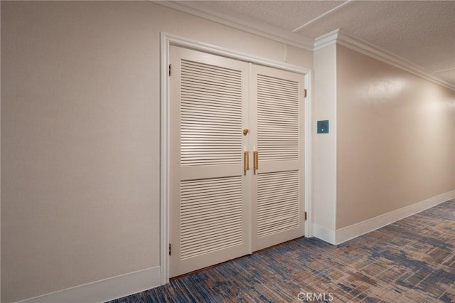 32735 Seagate Dr Unit 304-D, Rancho Palos Verdes, CA 90275 - detailed view of ornamental molding, baseboards, a textured ceiling, and wood finished floors