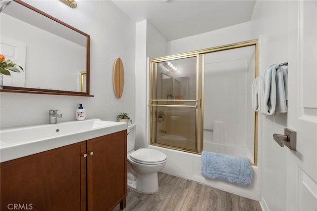 5814 Old Village Rd Unit 216, Yorba Linda, CA 92887 - full bath featuring wood finished floors, toilet, vanity, and shower / bath combination with glass door