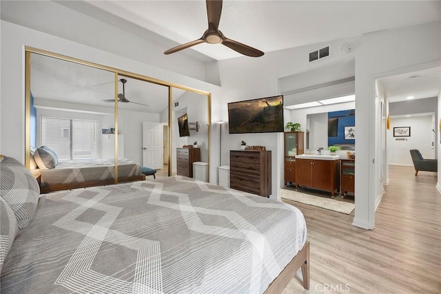 5814 Old Village Rd Unit 216, Yorba Linda, CA 92887 - bedroom with a closet, light wood-style floors, a sink, ceiling fan, and ensuite bathroom