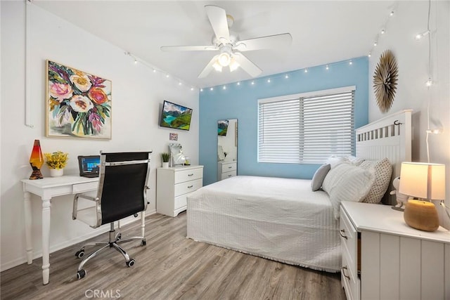 5814 Old Village Rd Unit 216, Yorba Linda, CA 92887 - bedroom with light wood finished floors, track lighting, an office area, and ceiling fan