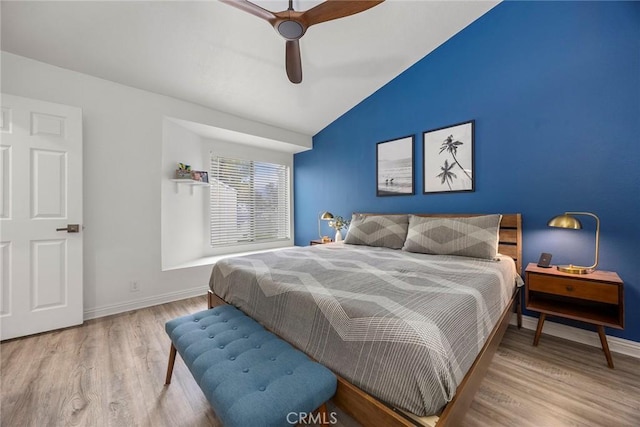 5814 Old Village Rd Unit 216, Yorba Linda, CA 92887 - bedroom with vaulted ceiling, wood finished floors, baseboards, and a ceiling fan