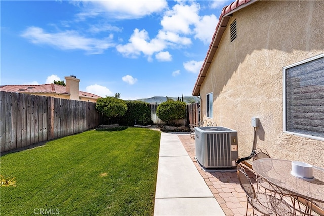 35189 Ravencrest Ct, Yucaipa, CA 92399 - view of yard with central AC and a patio