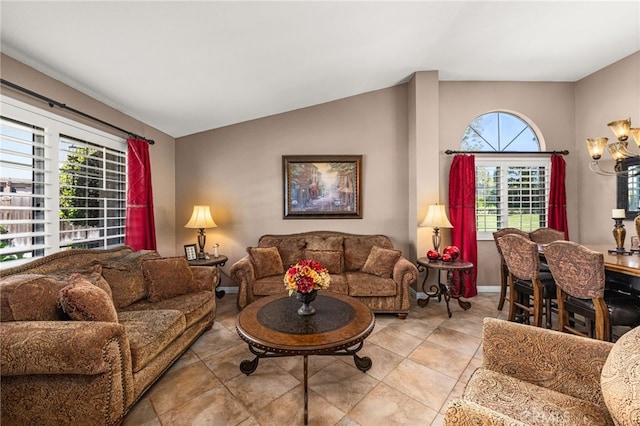 35189 Ravencrest Ct, Yucaipa, CA 92399 - living area featuring vaulted ceiling, light tile patterned floors, and baseboards