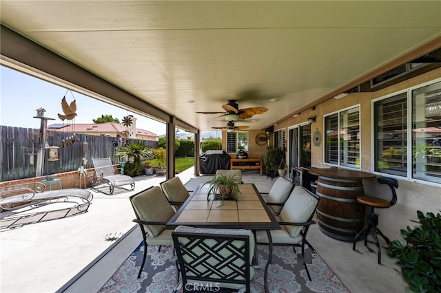 35189 Ravencrest Ct, Yucaipa, CA 92399 - view of patio with fence, ceiling fan, and outdoor dining area