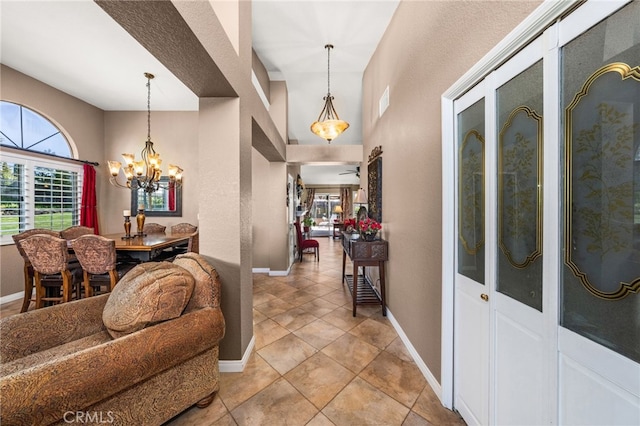 35189 Ravencrest Ct, Yucaipa, CA 92399 - entryway featuring a chandelier and baseboards