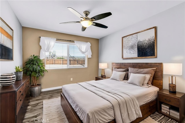 57330 Old Haggard Rd, Yucca Valley, CA 92284 - bedroom featuring wood finished floors, baseboards, and ceiling fan