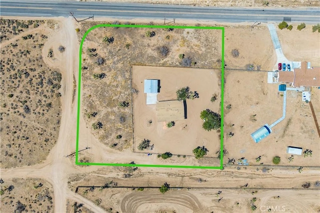 57330 Old Haggard Rd, Yucca Valley, CA 92284 - aerial view of sparsely populated area featuring property parcel outlined and a desert landscape