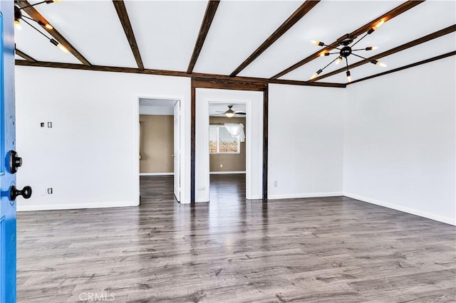 57330 Old Haggard Rd, Yucca Valley, CA 92284 - unfurnished living room with a chandelier, baseboards, wood finished floors, and beam ceiling