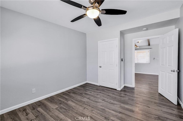 57330 Old Haggard Rd, Yucca Valley, CA 92284 - unfurnished bedroom featuring wood finished floors, baseboards, and ceiling fan