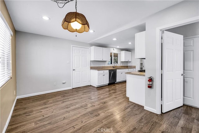57330 Old Haggard Rd, Yucca Valley, CA 92284 - kitchen with dishwasher, a sink, baseboards, white cabinets, and recessed lighting