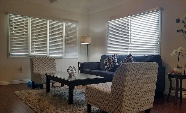 sitting room with wood finished floors and baseboards