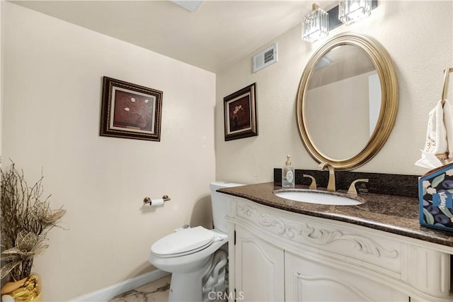 7936 Laramie Ave, Winnetka, CA 91306 - half bathroom with vanity, marble finish floors, and toilet