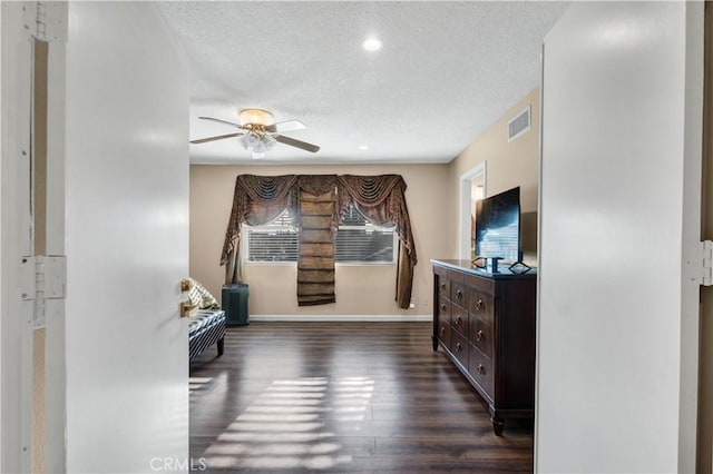 7936 Laramie Ave, Winnetka, CA 91306 - sitting room featuring dark wood finished floors, a textured ceiling, a ceiling fan, baseboards, and recessed lighting