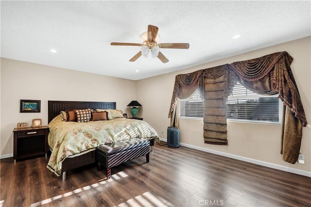 7936 Laramie Ave, Winnetka, CA 91306 - bedroom featuring baseboards, dark wood finished floors, a ceiling fan, recessed lighting, and a textured ceiling