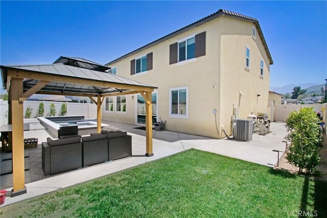 1212 Venice Ave, Mentone, CA 92359 - back of property with a gazebo, stucco siding, a patio, and an outdoor living space