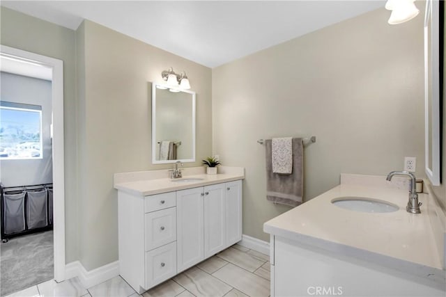 1212 Venice Ave, Mentone, CA 92359 - full bath with two vanities and baseboards