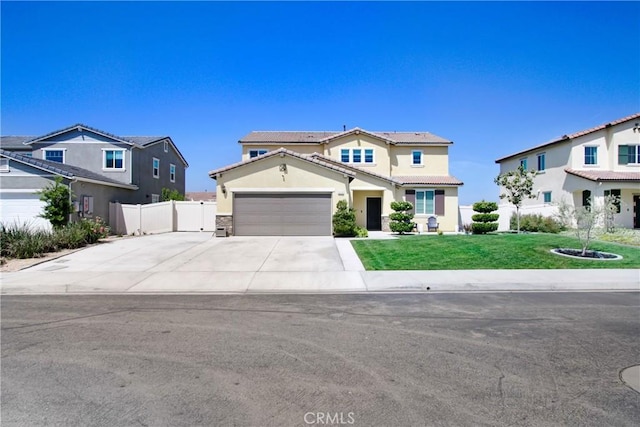 1212 Venice Ave, Mentone, CA 92359 - traditional-style home with an attached garage, driveway, and stucco siding
