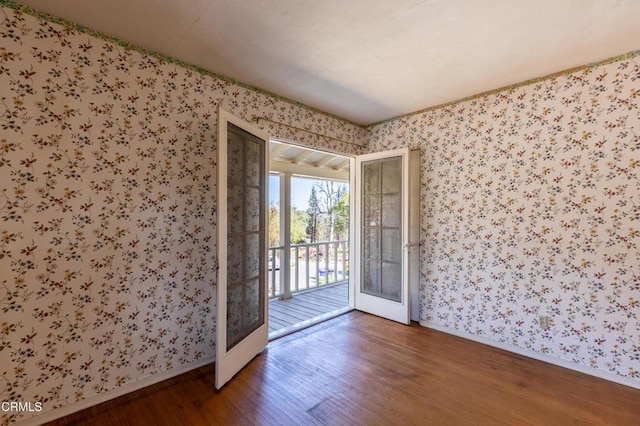 2577 Boulder Rd, Altadena, CA 91001 - unfurnished room with wallpapered walls, wood finished floors, and baseboards