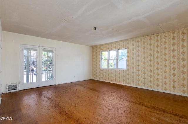 2577 Boulder Rd, Altadena, CA 91001 - spare room with wood finished floors, baseboards, wallpapered walls, and french doors
