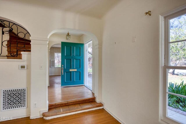 2577 Boulder Rd, Altadena, CA 91001 - entrance foyer featuring arched walkways and wood finished floors