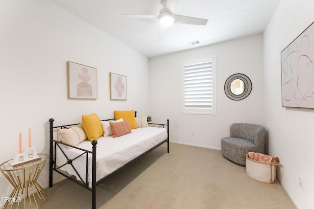 bedroom with carpet flooring, a ceiling fan, and baseboards