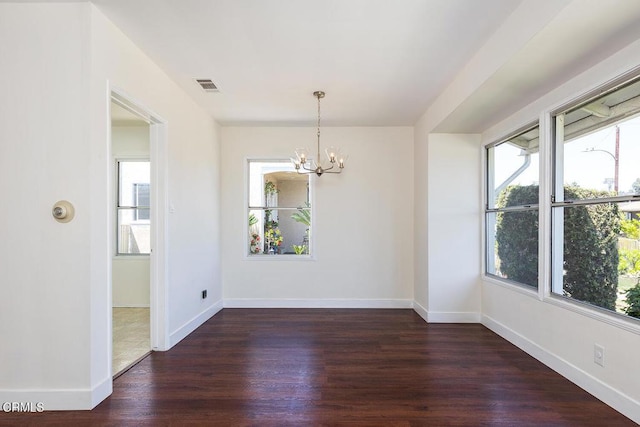 2327 Roscommon Ave, Monterey Park, CA 91754 - unfurnished dining area with plenty of natural light, a chandelier, and wood finished floors
