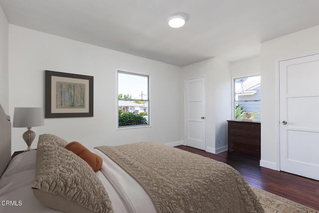 2327 Roscommon Ave, Monterey Park, CA 91754 - bedroom featuring dark wood-style flooring, multiple windows, and baseboards